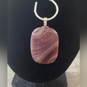 Artisan handcrafted cranberry & white fused glass pendant on silver plated curve